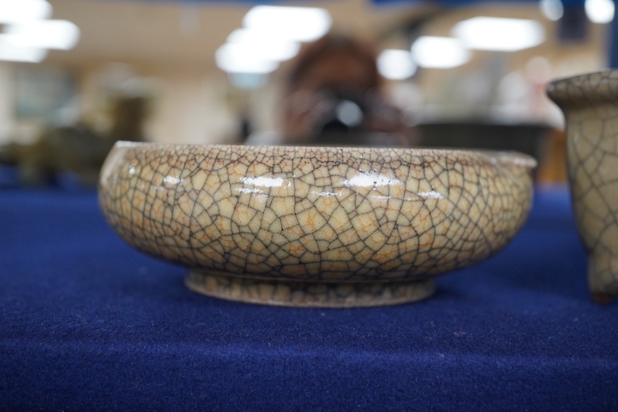 A Chinese crackle-glaze censer, 14cm wide, and a similar peach shaped brush washer, 12cm diameter (2). Condition - good.